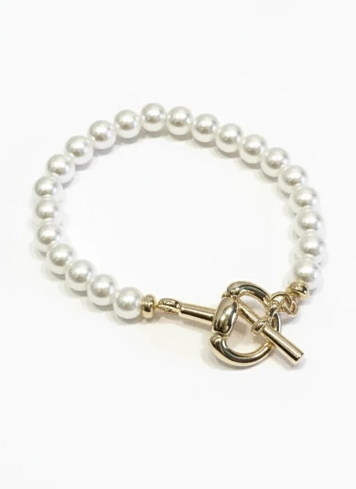 PEARL STRETCH BRACELET WITH GOLD HORSE BIT ACCENT