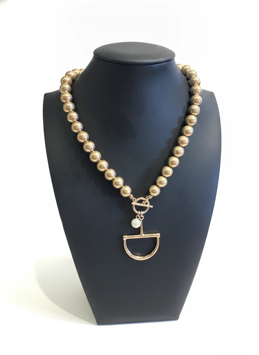 GOLD BEADED NECKLACE WITH HORSE BIT PENDANT & PEARL ACCENT