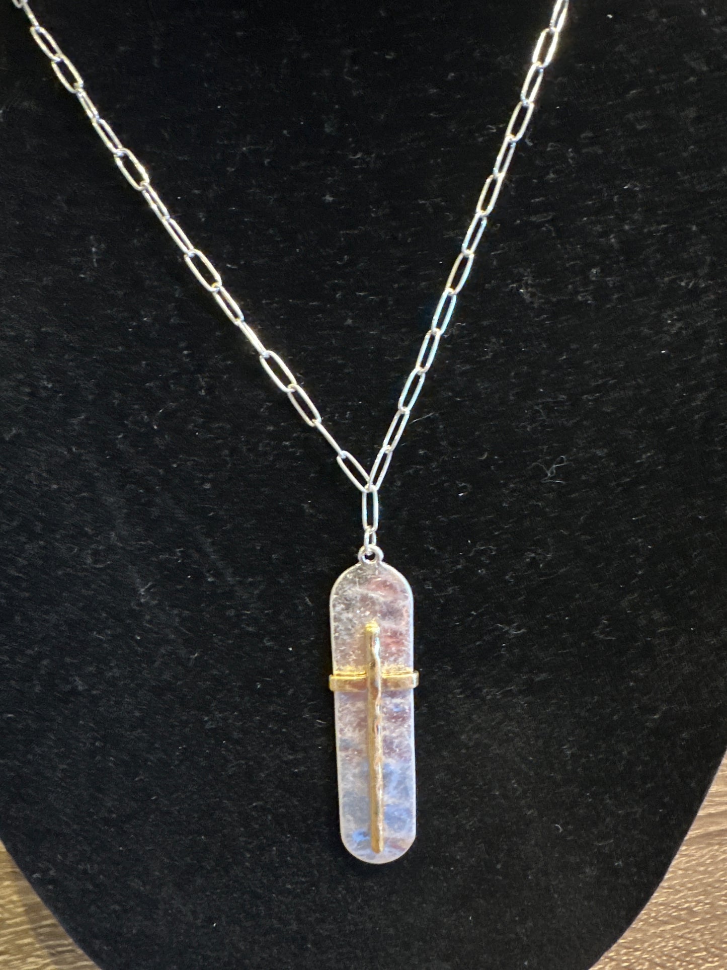 CROSS ON OVAL PENDANT