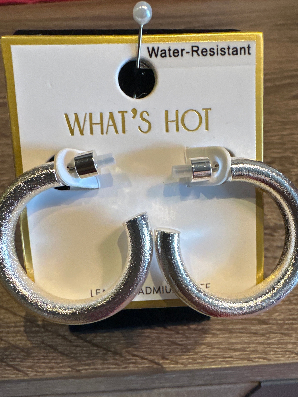 WHAT'S HOT WATER RESISTANT SILVER 1.4" TEXTURED METAL HOOP EARRINGS